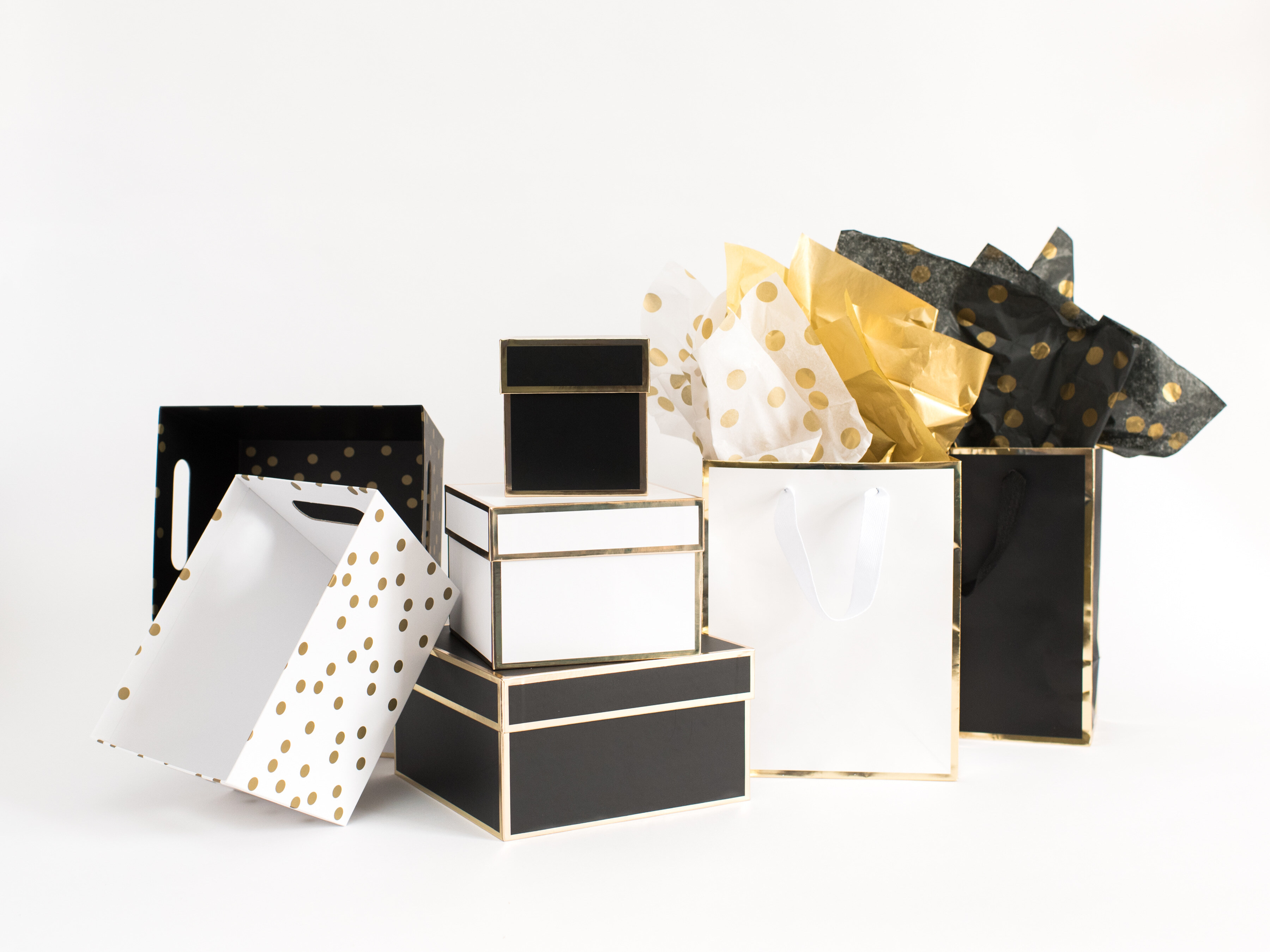 Black and white boxes and bags for wholesale packaging supplies in Canada