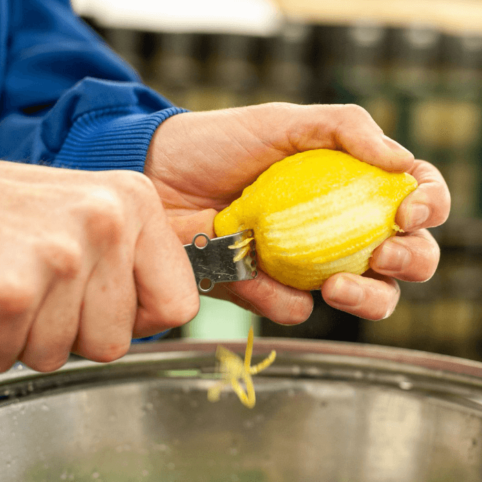lemon being peeled