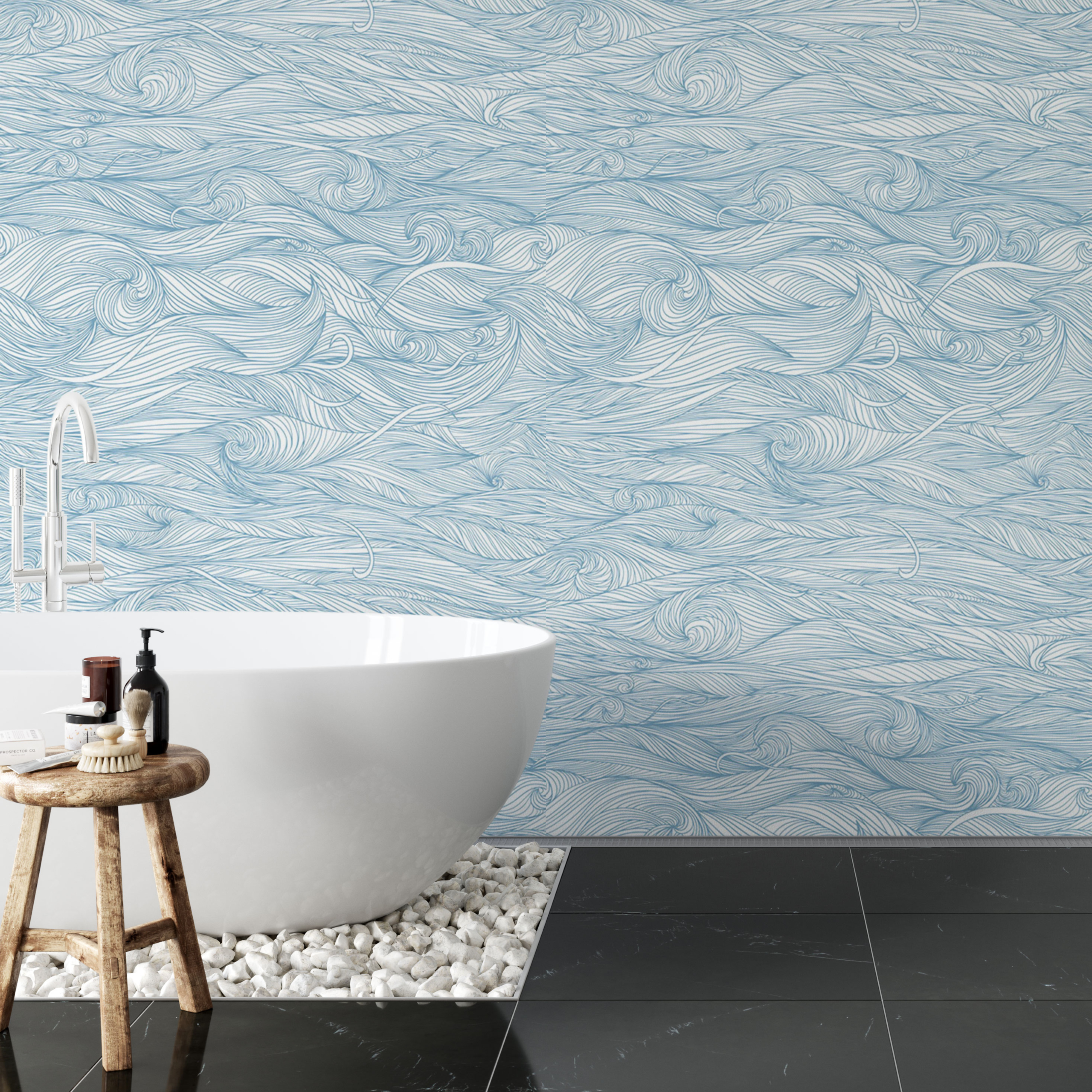 white bathtub in front of blue swirl wallpaper