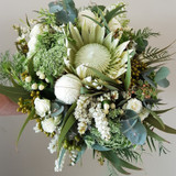 White King Protea - Seasonal flowers include disbuds, spray roses, andromeder, queen annes lace and gum foliage