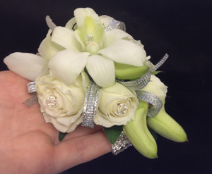 Leah spray rose and orchid corsage Leah spray rose and orchid corsage