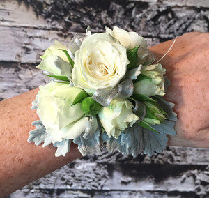 White spray rose Corsage with silver dusty miller foliage White spray rose Corsage with silver dusty miller foliage