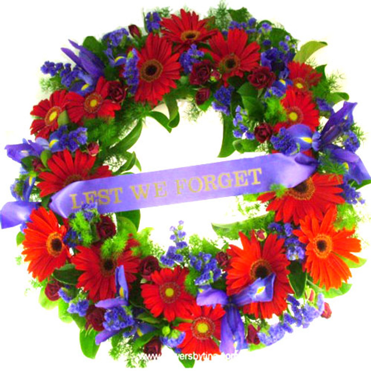 Deluxe 55cm across with LEST WE FORGET ribbon