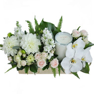 Addie - Arrangement of Phalaenopsis orchids, spray roses, stock, dahlias and a candle in a wooden box