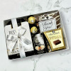 Close-up of admin appreciation gift box with assorted gourmet sweets and chocolate treats