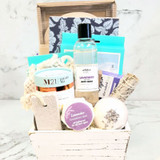 Lavender Spa Basket with bath essentials, lavender body care, facial masks, tea, and relaxation accessories