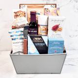 Gourmet Foodie Gift Basket with cheese, crackers, sausage, balsamic vinegar, popcorn, and gourmet snacks