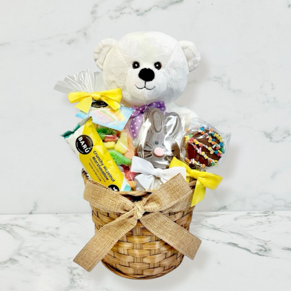 Easter gift basket beautifully packaged with festive treats and plush toy for Toronto delivery