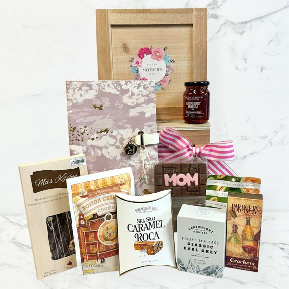 Mother’s Day gift basket featuring Earl Grey tea, sweet treats, savory snacks, and a pink keepsake journal