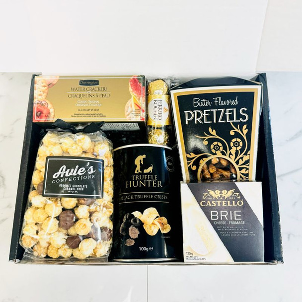 Game Day Gourmet Basket with savory snacks, chocolates, truffle crisps, and Castello Brie, available for Canada-wide delivery.