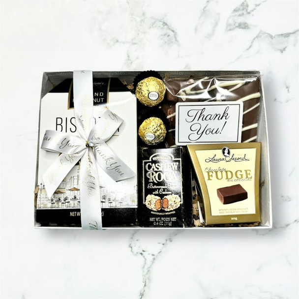 Admin Appreciation Gift Box with biscotti, chocolates, fudge, and toffee bites arranged in a gift basket