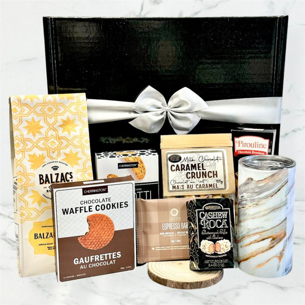 Coffee gift basket featuring Balzac’s coffee, marble mug, chocolate treats, biscotti, and snack assortment