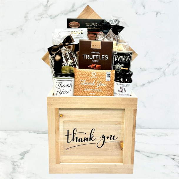 Luxury thank you gift crate featuring truffles, chocolate treats, savory crackers, and gourmet snacks