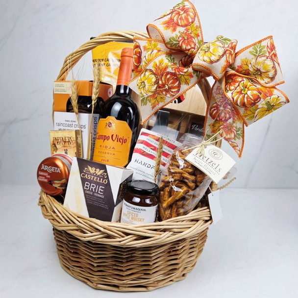 Gourmet Thanksgiving gift basket with cheese board, Castello Brie, wine and gourmet snacks
