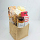 Thanksgiving food gift basket featuring sweet chili nuts, Parmesan popcorn, pretzels and milk chocolate Oakville