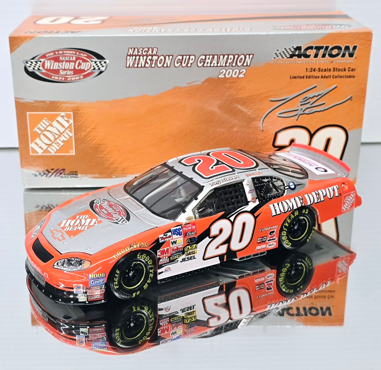 TONY STEWART VICTORY LAP #20 MONTE CARLO 1/24 ACTION DIECAST (DAMAGED BOX  BUT THE CAR IS MINT)