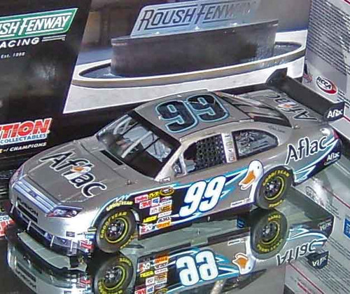 CARL EDWARDS 2010 SCOTTS TURF BUILDER SPECIAL 1/24 ACTION