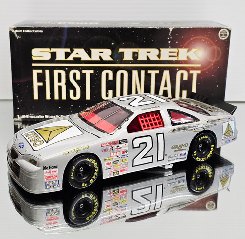 MICHAEL WALTRIP 1996 STAR TREK FIRST CONTACT 1/24 ACTION (SLIGHTLY WORN BOX BUT THE CAR IS MINT)