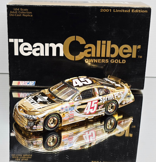 KYLE PETTY 2001 SPRINT *GOLD* 1/24 TEAM CALIBER OWNER'S DIECAST (BOX HAS SHELF WEAR BUT THE CAR IS NEW & MINT)