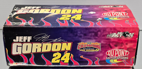 JEFF GORDON 2002 DUPONT FLAMES 1/24 ACTION DIECAST (DAMAGED BOX BUT THE CAR IS MINT)