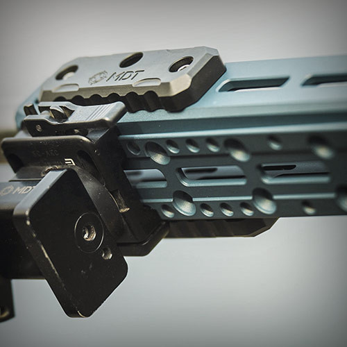 R-LOK INTERFACE ALONG BOTTOM SURFACE OF THE FOREND