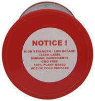 Top view of Cuisine Tech Uno stabilizer cylinder, showing the sealed lid, product code, and 1 lb net weight marking.