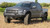 Addictive Desert Designs 10-14 Ford F-150 Raptor HoneyBadger Front Bumper w/ Winch Mount