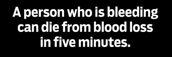 Dr. Elliott R. Haut, demonstrates how to use a tourniquet