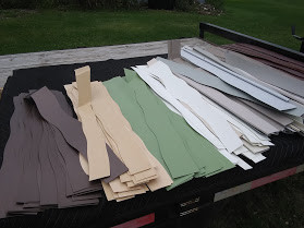 Wide reclaimed PVC limbs laid out for a mid-depth DIY freshwater fish habitat project