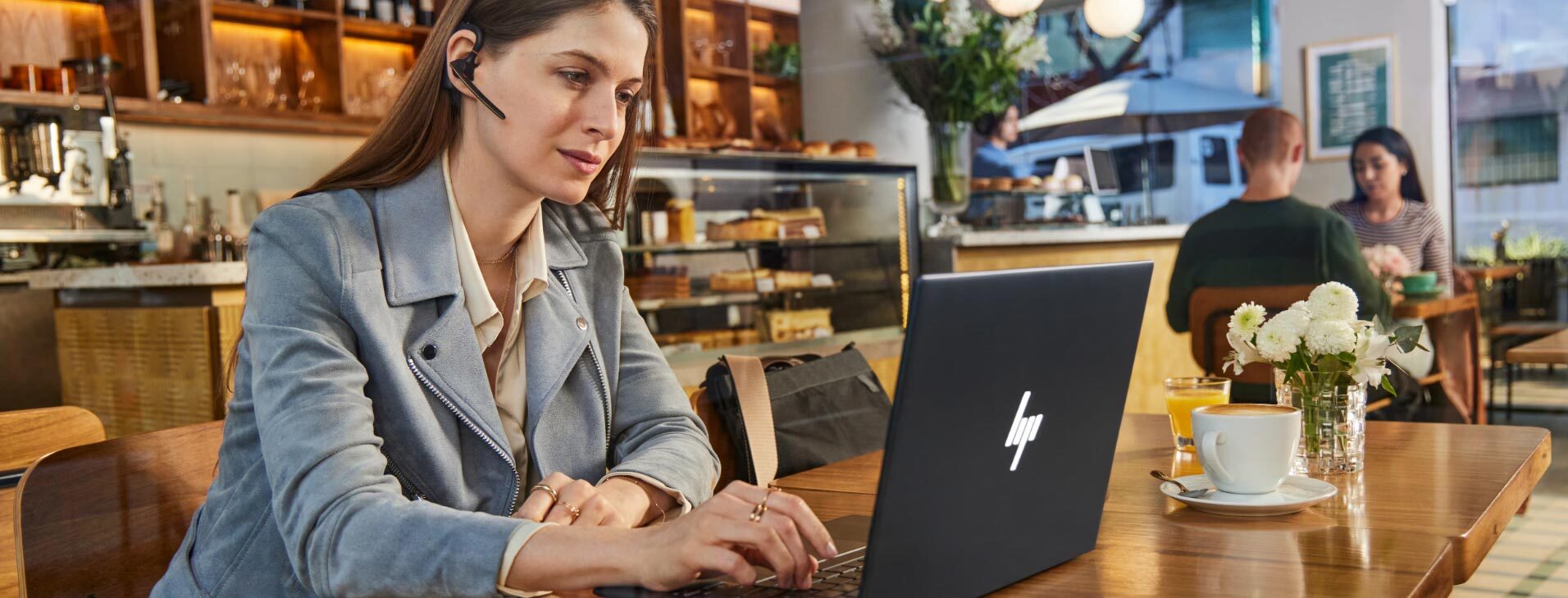 Lady on HP Laptop at Café Lady on HP Laptop at Café