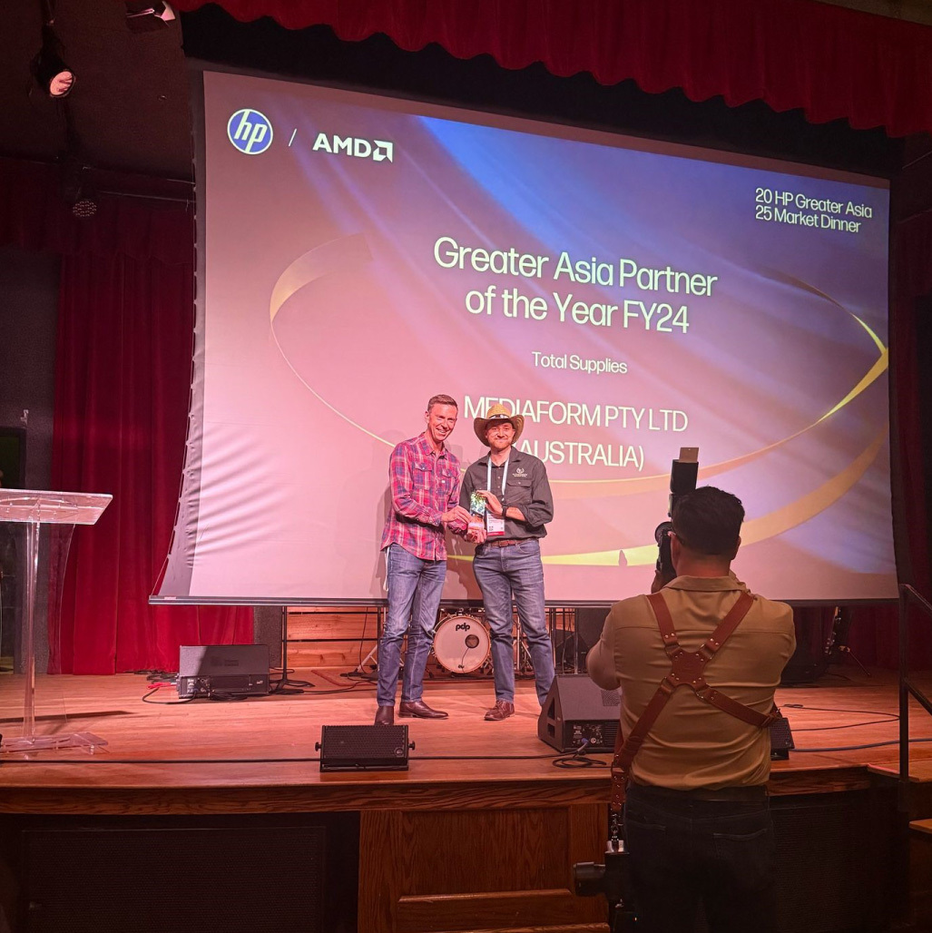 MediaForm Receiving the Award on Stage