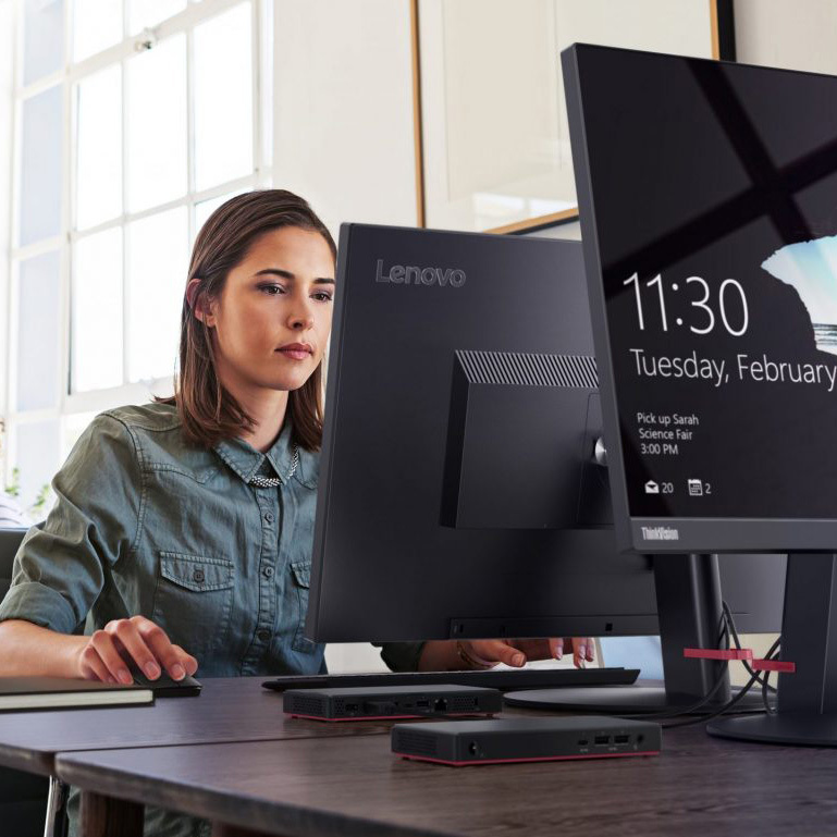 Woman using Lenovo Desktop