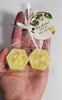 yellow bee and honeycomb soap for a baby shower favor
