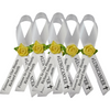 white funeral ribbon with black text funeral pins