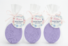 purple favors with personalized tags for butterfly theme shower