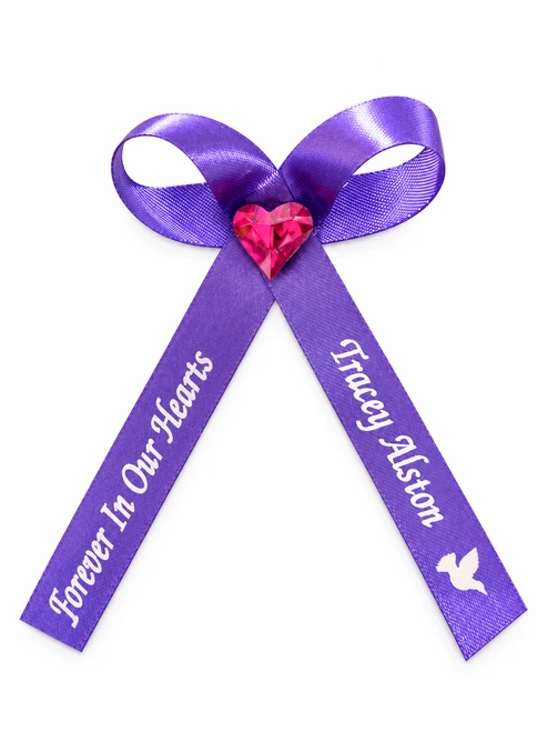 purple memorial ribbon pins to wear at a funeral