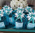 teal ribbon with silver cross