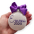 white glitter with purple lettering and bow ornament