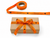 orange with black roll of continuous print ribbons