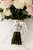 white ribbon with black handwritten font lettering wrapped around a bouquet