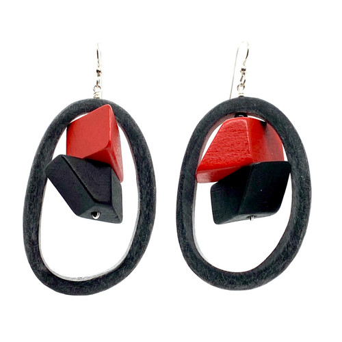 Two wood blocks and buffalo horn earrings