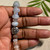 blue quartz, rainbow moonstone and pink muscovite bracelet in the hand