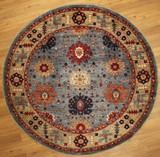 Traditional Eight foot round hand knotted rug 