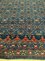 Light blue Tribal design room size rug 8'2 X 10'