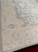Traditional faded floral room-sized hand-knotted rug made in Pakistan, 7'11"x9'10"