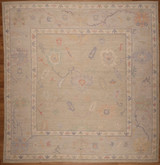 Faded Pakistani hand-knotted carpet with colorful floral design 9'11 x 10'4