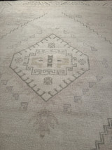 Transitional pastel color hand knotted 8'x10' rug.