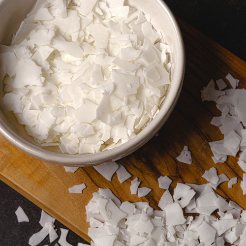 Premium Photo  Close up of white soy wax flakes for candle making in a  ceramic bowl