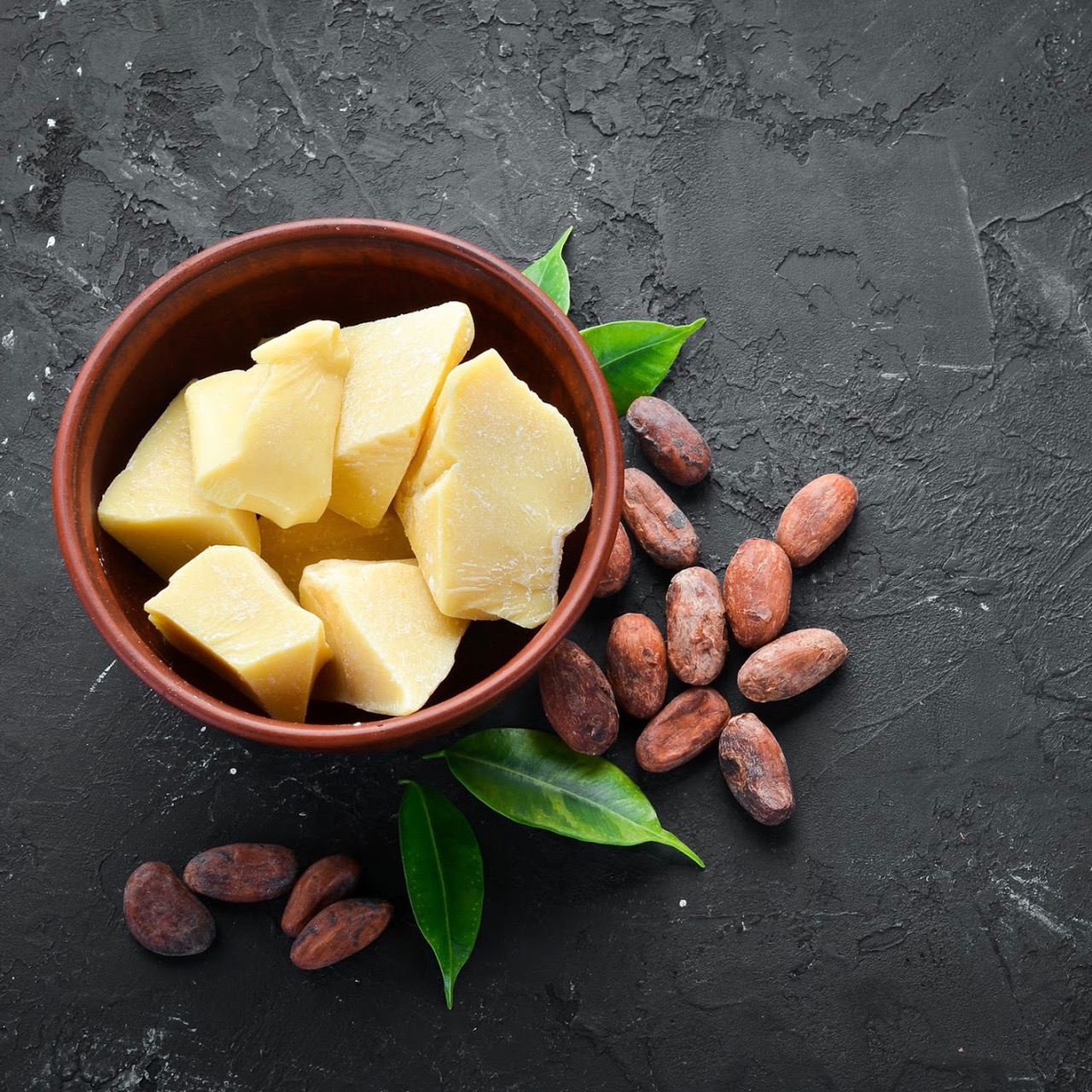 Какао тертое кот д ивуар. Какао масло нерафинированное. Cocoa butter масло. Твердое масло какао. Какао масло кусковое.