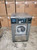 Continental front load washing machine Coin operated , MODEL: EH040C11321111, Serial no: 1470861E08